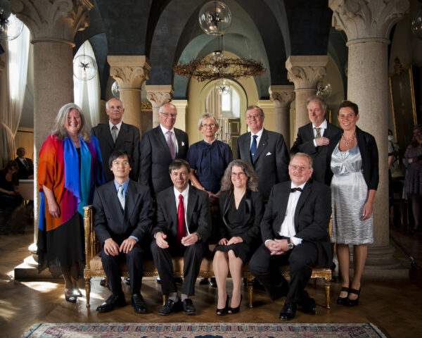 Back row from the left: Britt-Marie Sjöberg, Arne Ardeberg, Lennart Nilsson, Margareta Nilsson, Staffan Normark, Bo Berndtsson, Ebba Fischer. Front row from the left: Terence Tao, Jean Bourgain, Andrea Ghez, Reinhard Genzel. Photo: Jan Nordén.